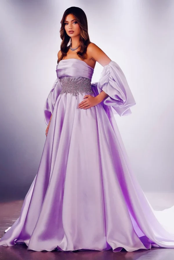 A woman wearing a light purple butterfly gown
